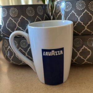 A Blue and White Oneida LavAzza Coffee Mug
